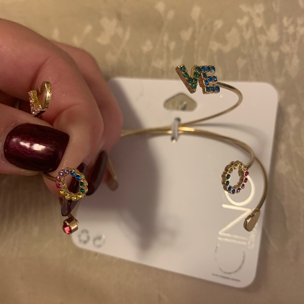 ICING triple gold tone bracelet “love” set with multicolored rhinestone accents